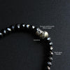 Black Stone & White Copper Om Mani Padme Hum Charm Bracelet - Zodeys