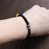 Black Stone & White Copper Om Mani Padme Hum Charm Bracelet - Zodeys